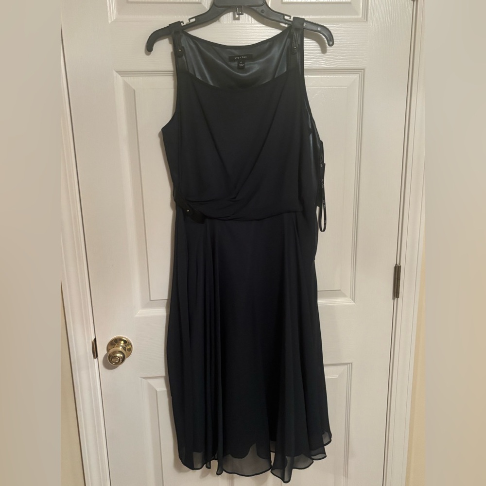 Ivy and blue green dress in size 12 with zipper on the side.